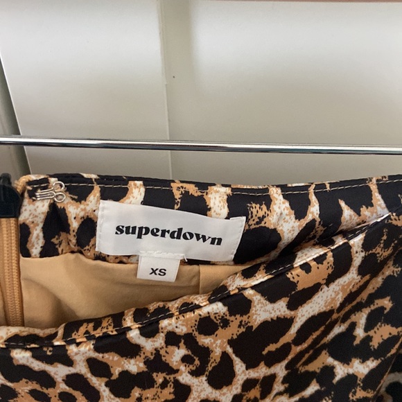 Revolve Superdown XS cheeta skirt with asymmetrical hem. Work once - Picture 3 of 7